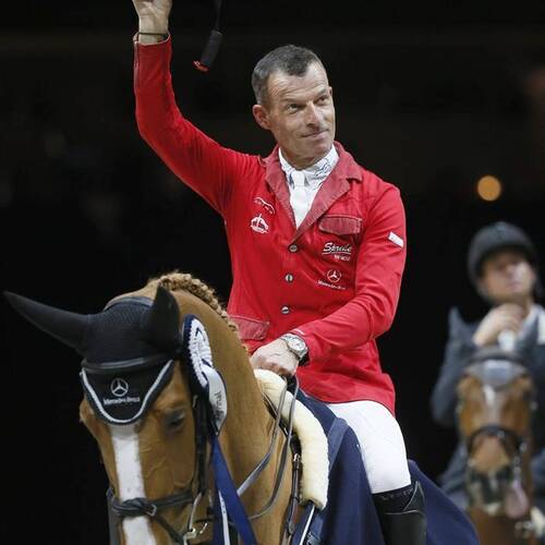 Pius Schwizer is in the lead after the first part of the Longines FEI World Cup Final on Quidam de Vivier