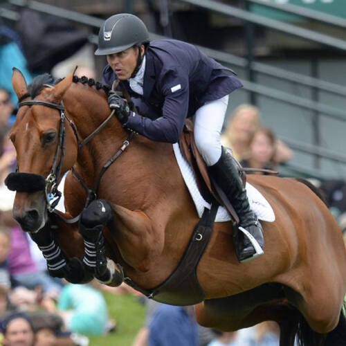 KENT FARRINGTON AND GAZELLE GALLOP TO VICTORY IN SPRUCE MEADOWS