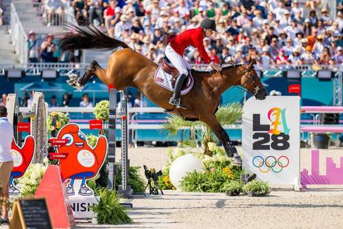 Photo caption: Team silver medallist Karl Cook (USA) riding Caracole de la Roque in the individual Jumping final at the Paris 2024 Olympic Games on 6 August 2024. © FEI/Benjamin Clark