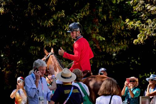 Steve Guerdat (SUI) with DYNAMIX DE BELHEME  at the Paris Olympics - Jumping Individual final. Copyright of FEI / Liz Gregg.