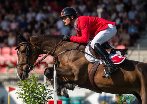 Longines FEI Jumping Nations Cup™ 2023 St. Gallen, SwitzerlandBRYAN BALSIGER of Switzerland on DUBAI DU BOIS PINCHET tackles a jump in the Longines FEI Jumping Nations Cup of Switzerland in St. Gallen, Switzerland, June 2, 2023.