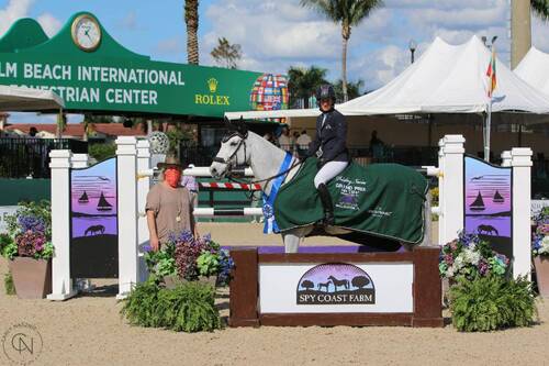 Laura Kraut and Confu, pictured with Lisa Lourie of Spy Coast Farm, won the $214,000 Spy Coast Farm Holiday II Grand Prix CSI4*. ©Carly Nasznic Photography