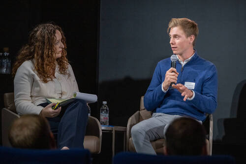 Hannes Ahlmann (GER), part of the Young Riders Academy Team 2023, pictured in a panel discussion with Áine Power, FEI Executive Director, Sport and Games discussion at the FEI Jumping Tack Forum on 14 October 2025. © FEI/Félix Imhof
