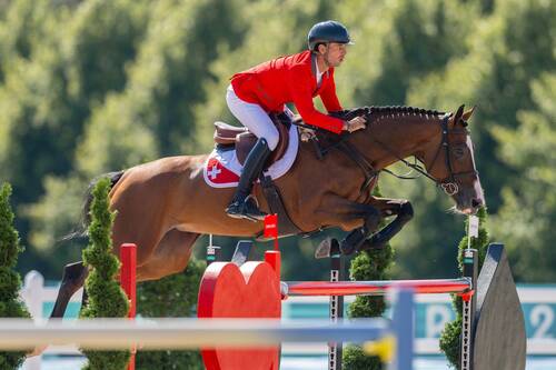 Steve Guerdat (SUI) with DYNAMIX DE BELHEME at the Paris Olympics - Jumping Individual final. Copyright of FEI / Liz Gregg.